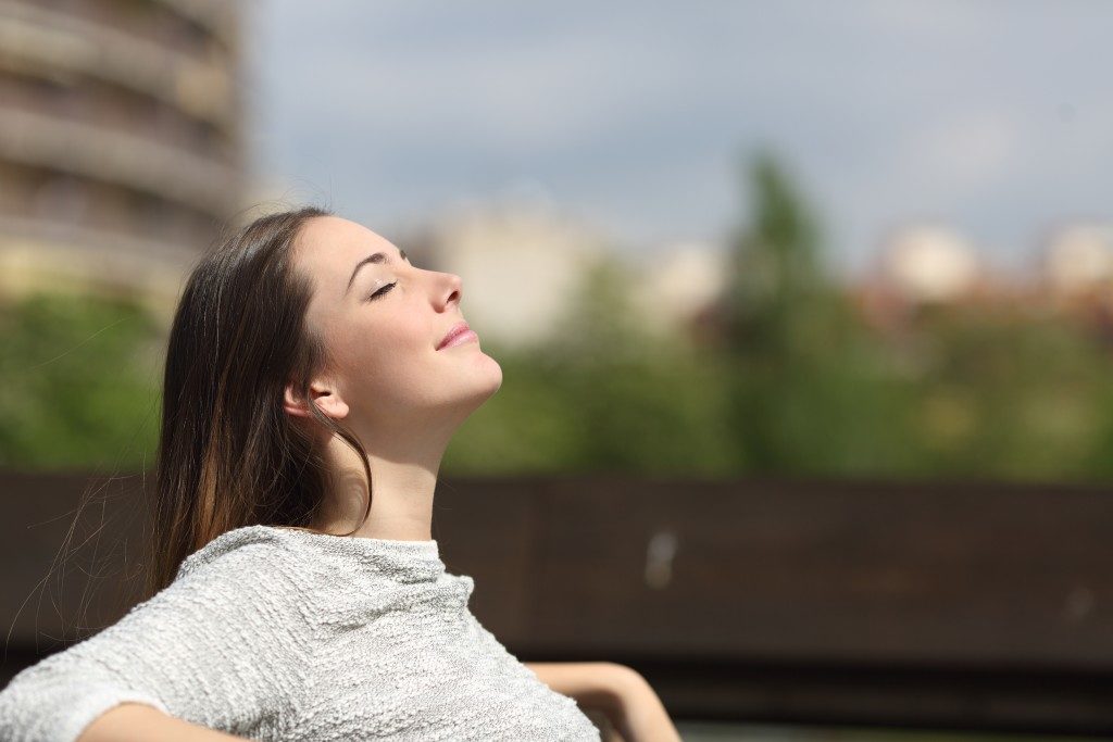 Girl breathing fresh air